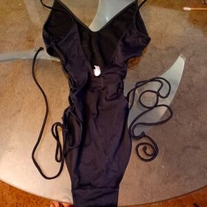 VICTORIAS SECRET SIDE LACED,SEMI THONG ON PIECE BATHING SUIT.NEVER WORN